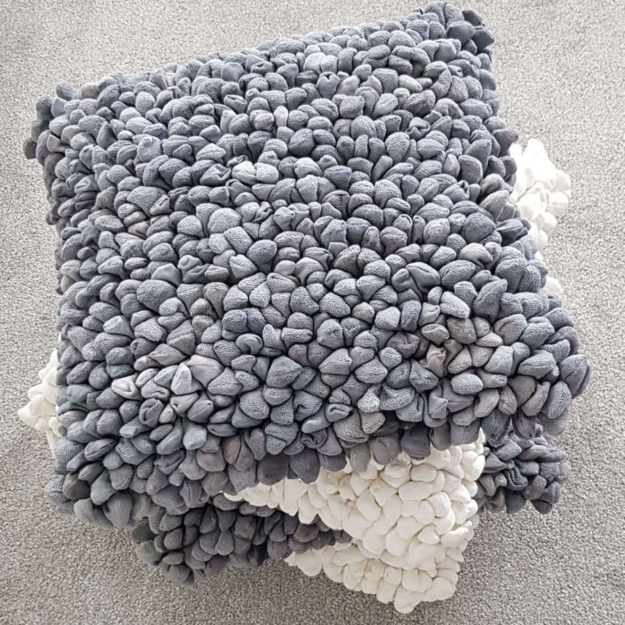 Steel grey pebble design cushion