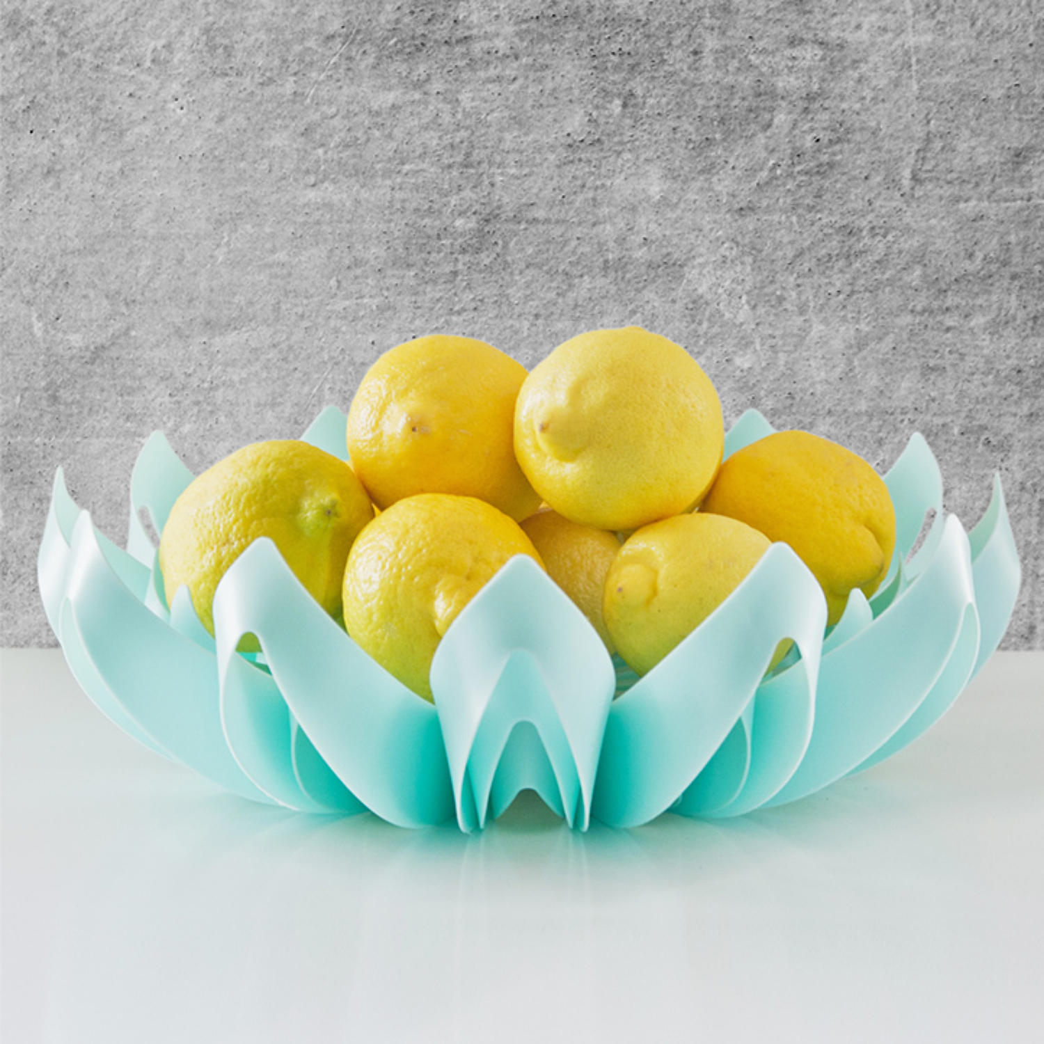 Turquoise petal shape fruit bowl