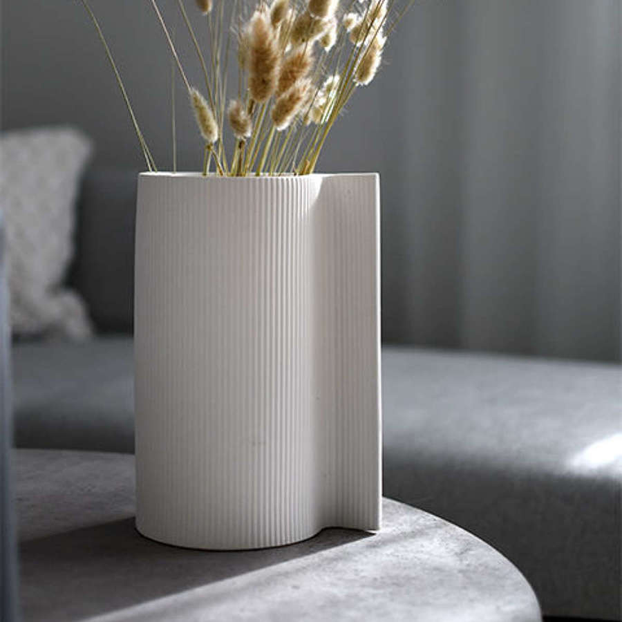 White ribbed matt ceramic vase