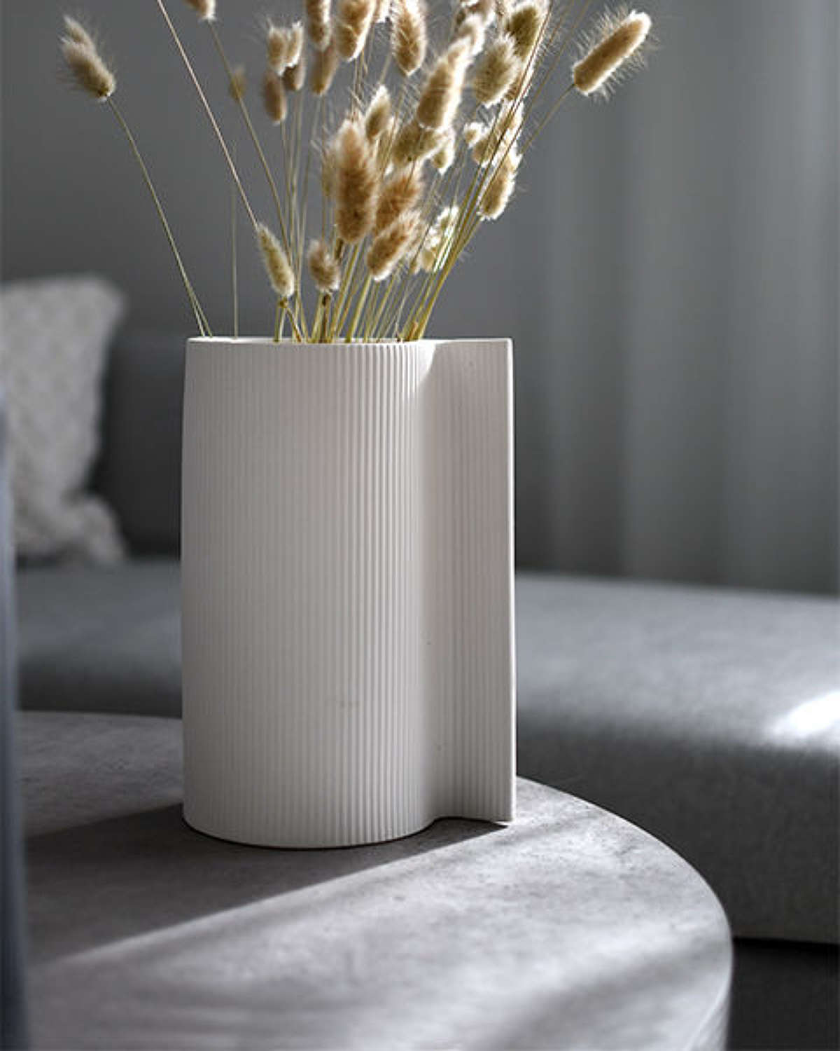 White ribbed matt ceramic vase