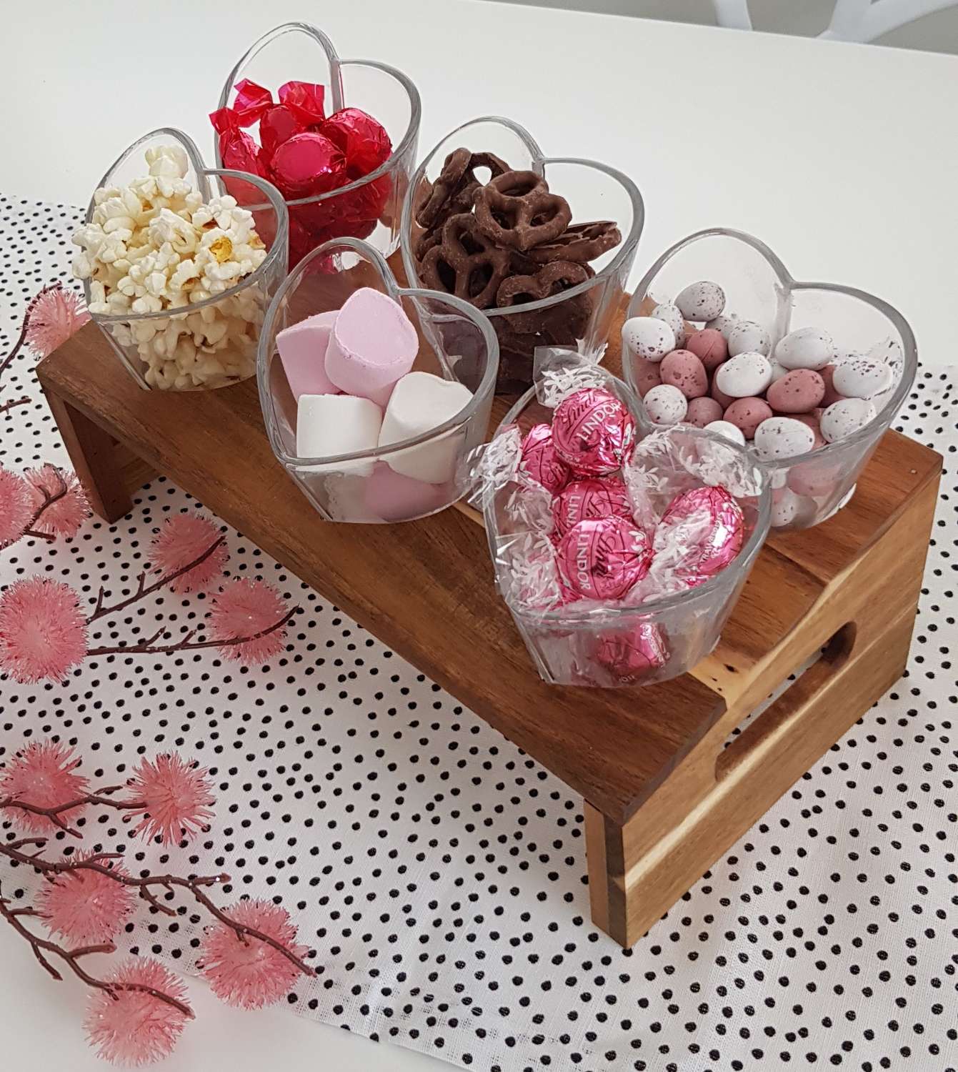 Snacking station – natural wood stand with heart shape glass cones