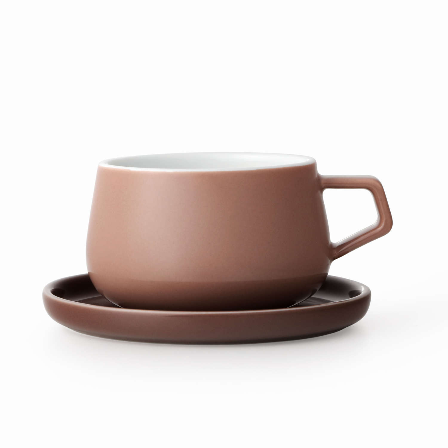 Powder brown and white porcelain cup and saucer