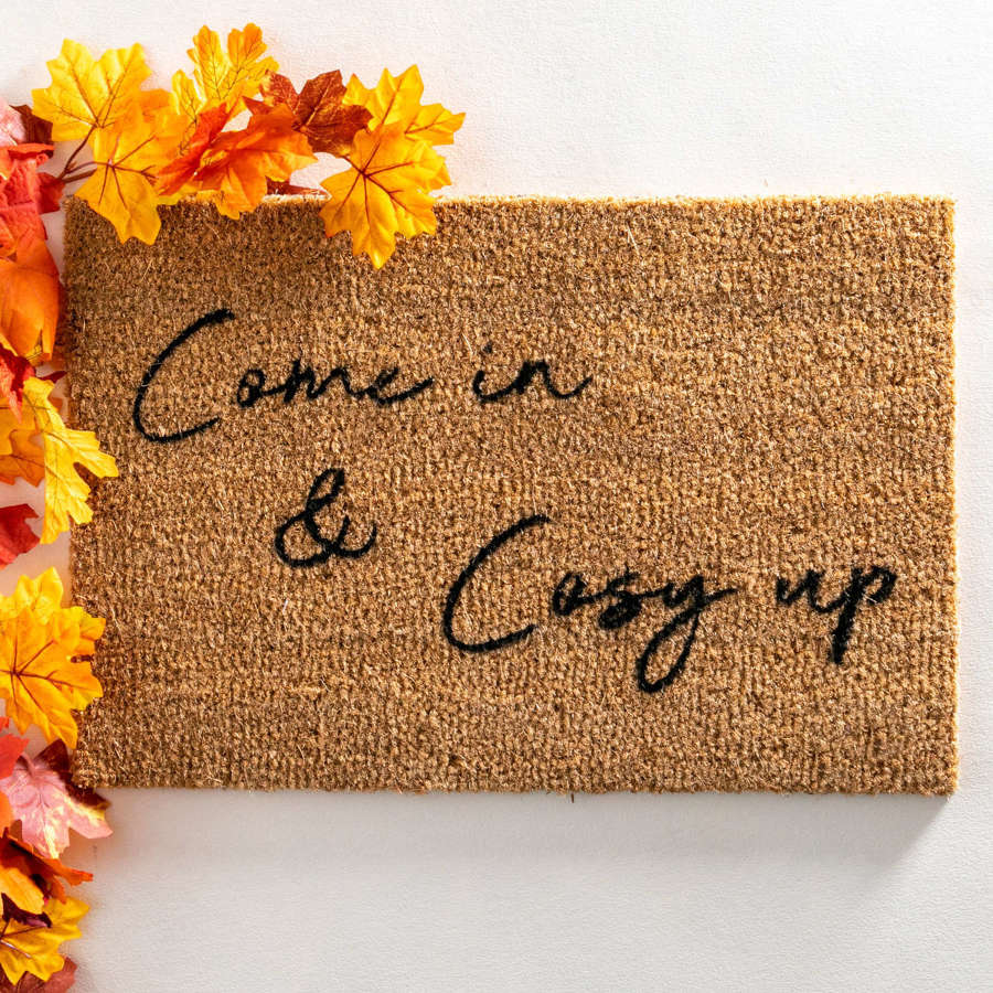 Black come in and cosy up design standard size doormat