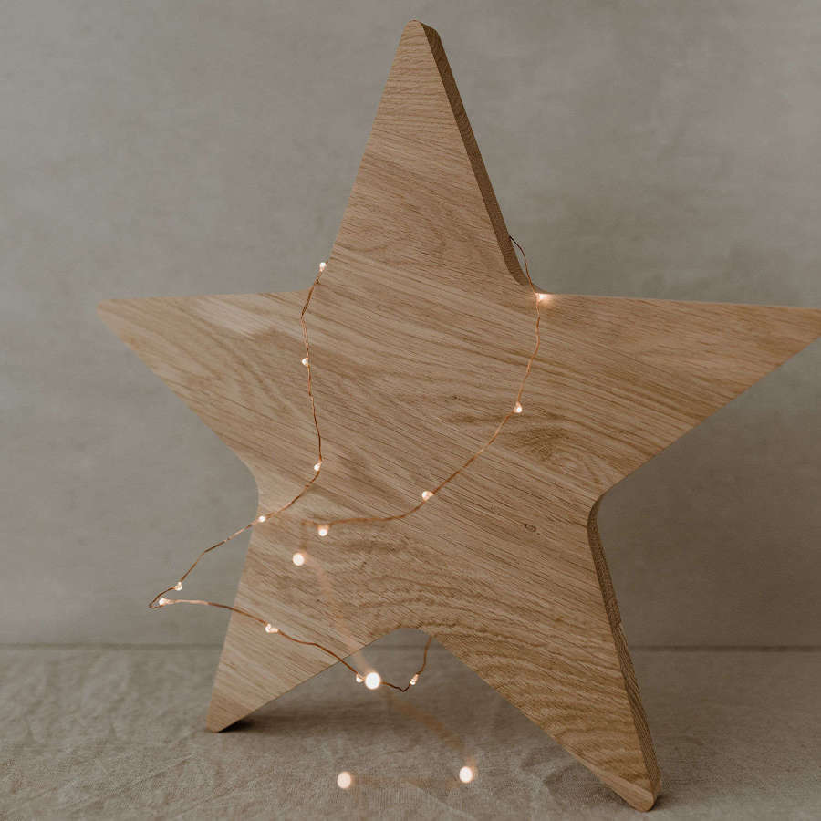 Star shaped solid oak chopping or serving board