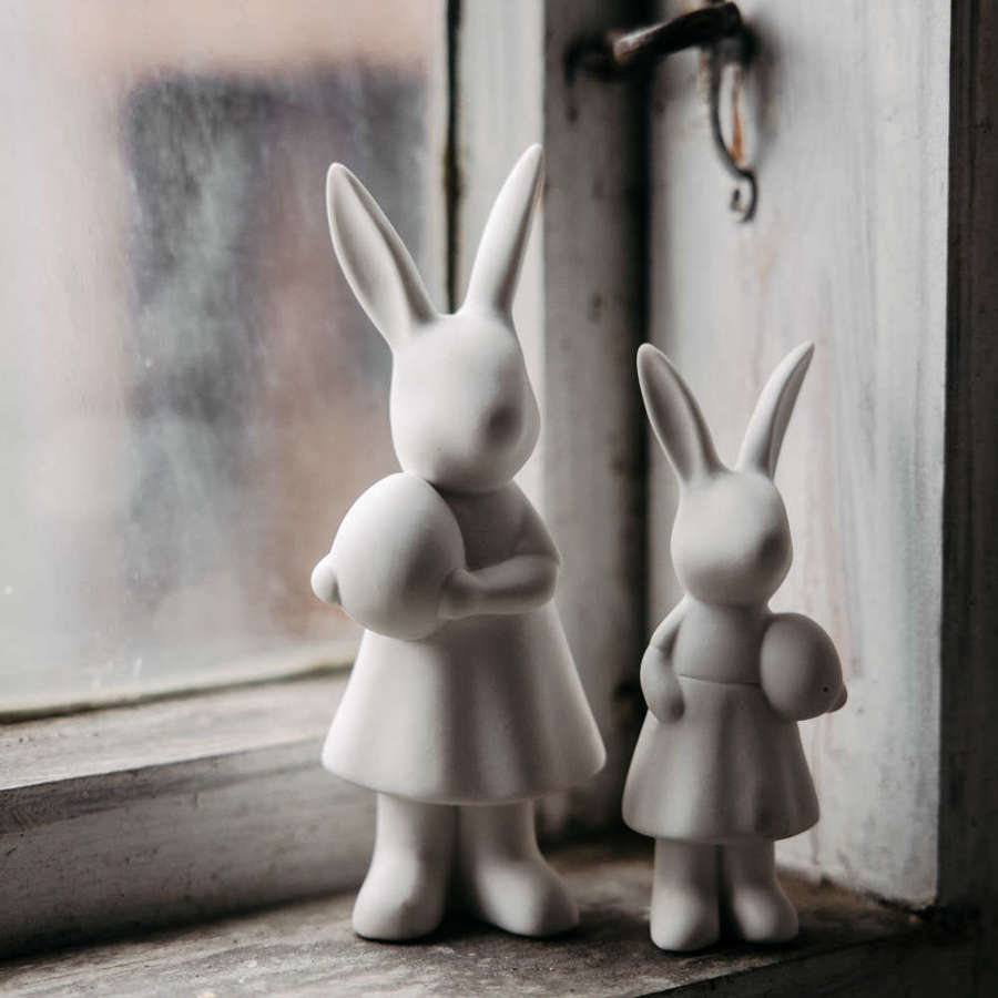 White ceramic bunny in dress
